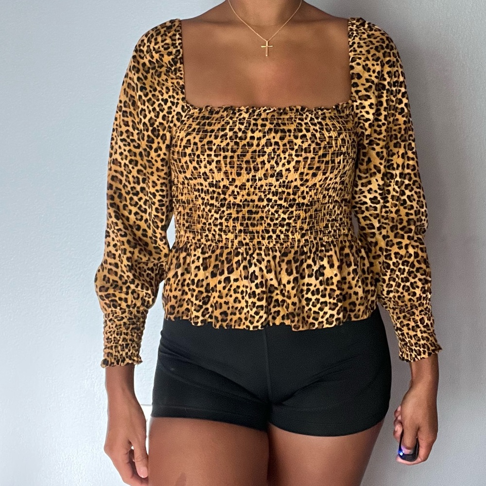 Leopard print shirt.